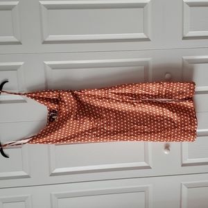 Satin polka dot slip dress in burnt orange